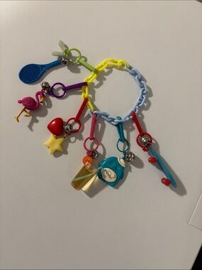 Michaels Retro 80's Reproduction Flash
Charm Bracelet- 6 Charms Included